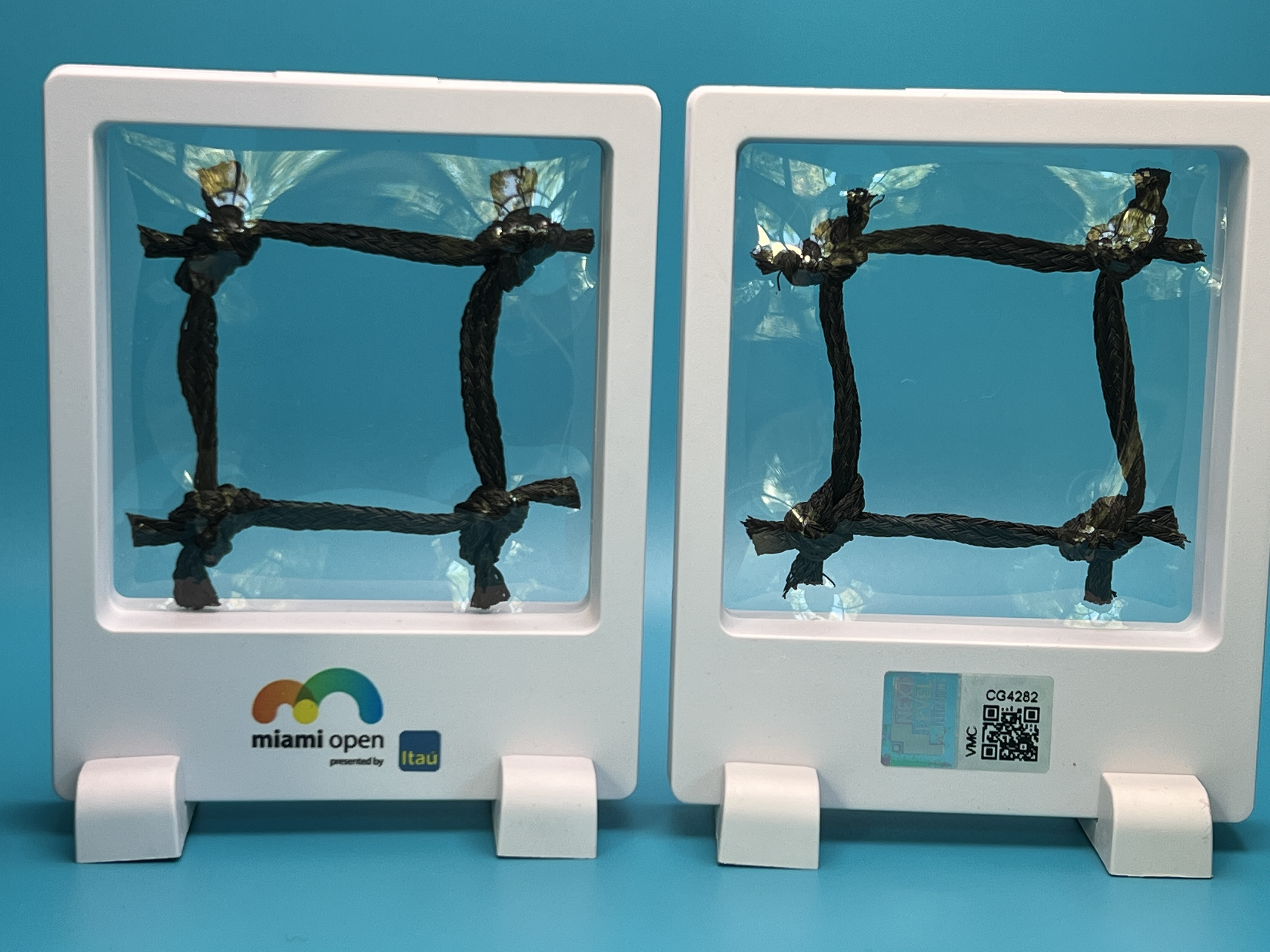 This is a square from the stadium court net used in the WTA 1000 women’s final match at the 2023 Miami Open presented by Itaú.  The match featured the #10 seed Elena Rybakina vs. the #15 seed Petra Kvitová, and was won by Kvitová in two sets.