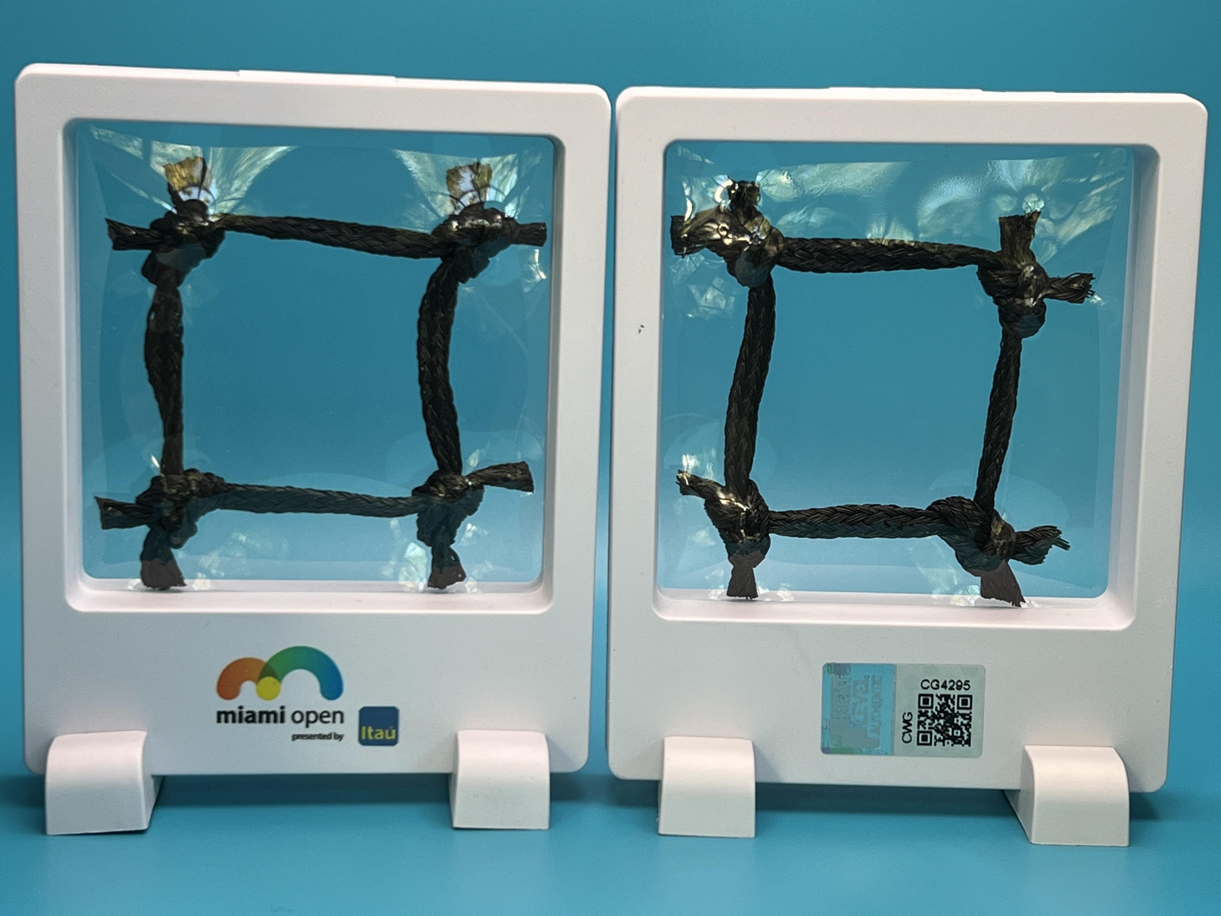 This is a square from the stadium court net used in the WTA 1000 women’s final match at the 2023 Miami Open presented by Itaú.  The match featured the #10 seed Elena Rybakina vs. the #15 seed Petra Kvitová, and was won by Kvitová in two sets.